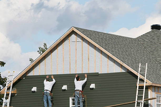 Professional Siding Installation technician working in Springfield, CO
